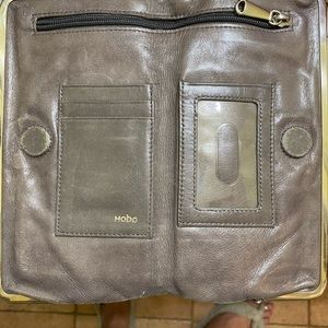 Hobo wallet with magnetic closure and two snaps